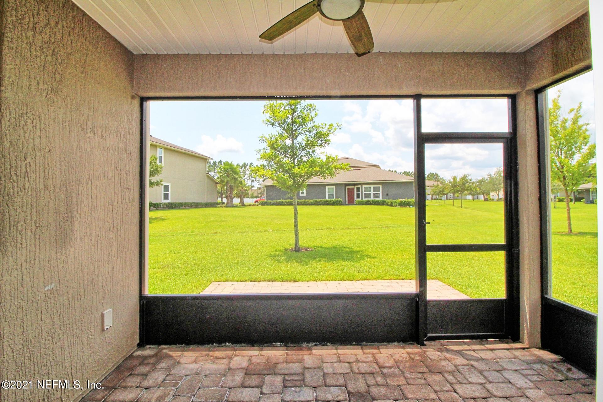 3207 Chestnut Ridge Way, Unit 18F Orange Park, FL 32065 - Photo 21 of 28 Enclosed lanai
