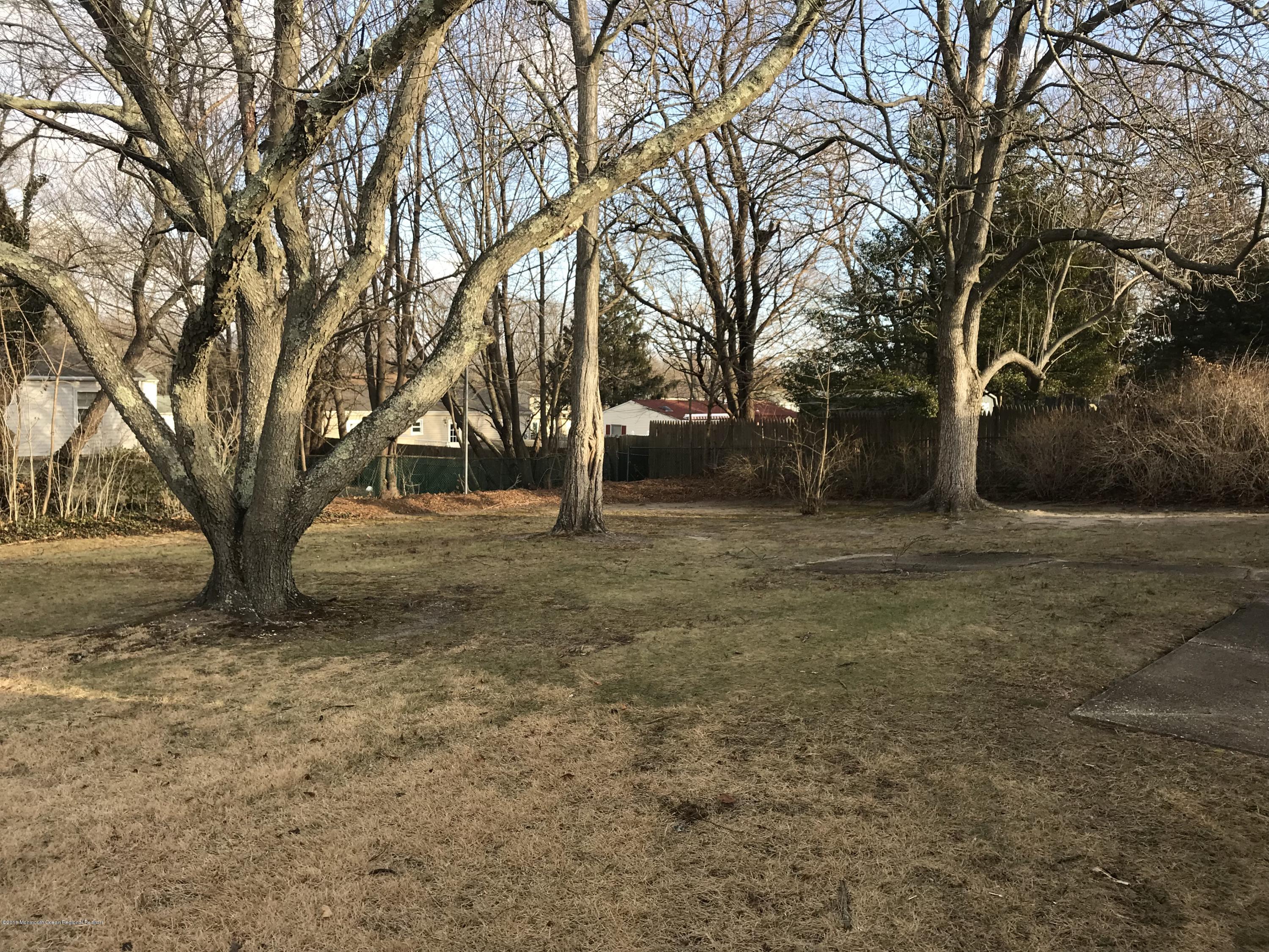 28 Mallard Road Bayville, NJ 08721 - Photo 5 of 8 a view of a yard with a house