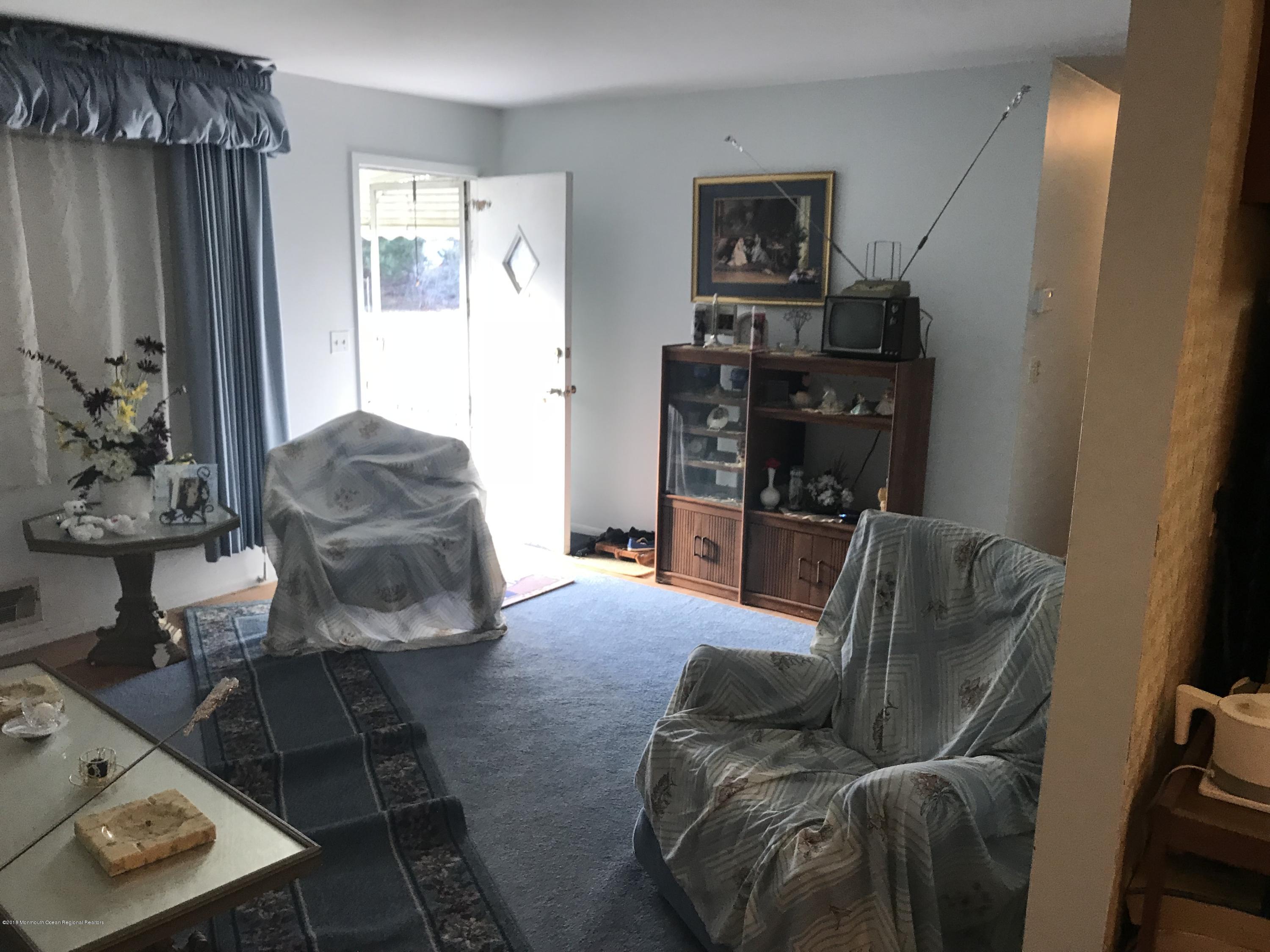 28 Mallard Road Bayville, NJ 08721 - Photo 7 of 8 a living room with furniture and a window