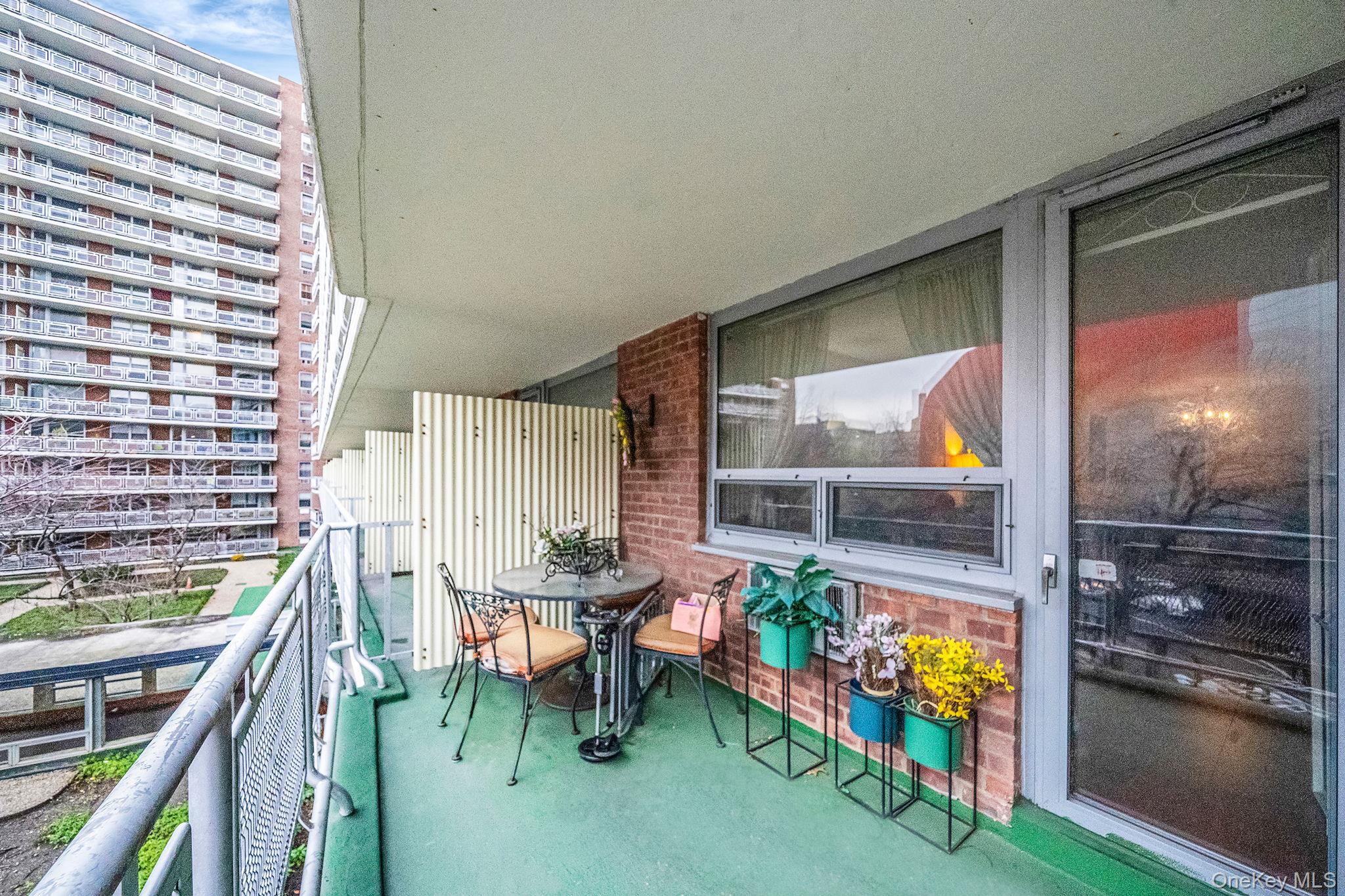 61-25 97th Street, Unit 2B Queens, NY 11374 - Photo 8 of 22 an outdoor living room with furniture