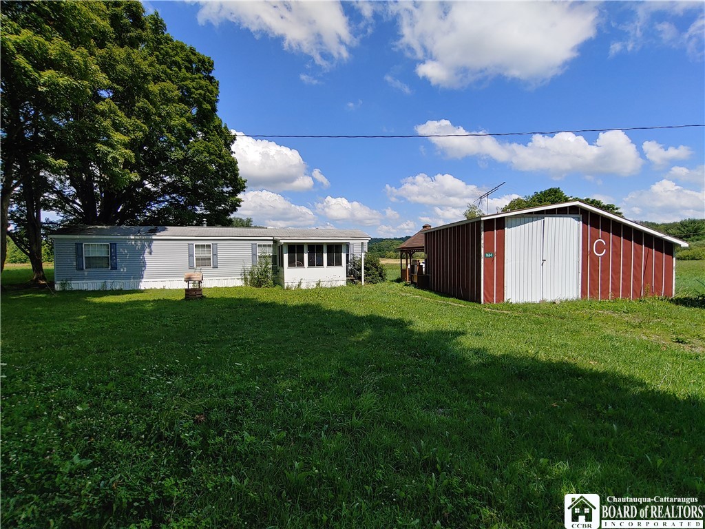 9684 Dye Road Villenova, NY 14062 - Photo 1 of 1 Front view with 1 of the garages
