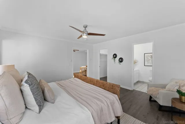 a bedroom with a bed and furniture