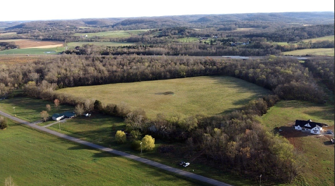 0 Golden Hollow Road Kelso, TN 37348 - Photo 5 of 8 a view of a lake with a mountain
