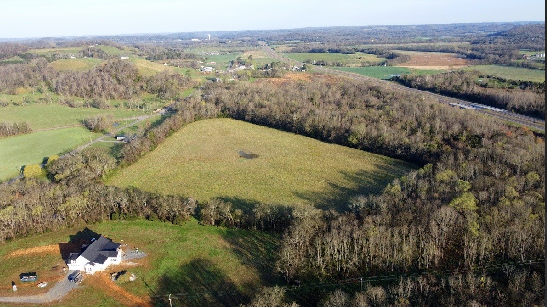 0 Golden Hollow Road Kelso, TN 37348 - Photo 7 of 8 a view of a lake with mountains in the background