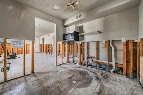 a white toilet sitting next to a bathroom sink