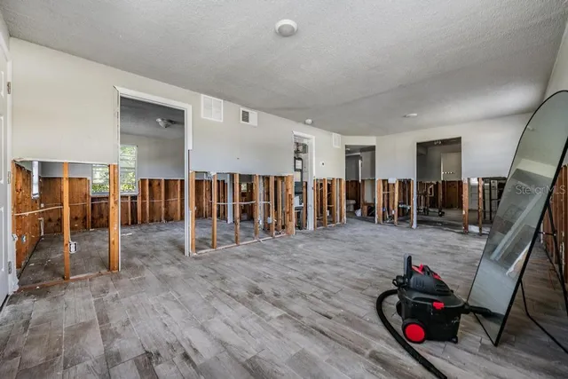 a living room with lots of furniture
