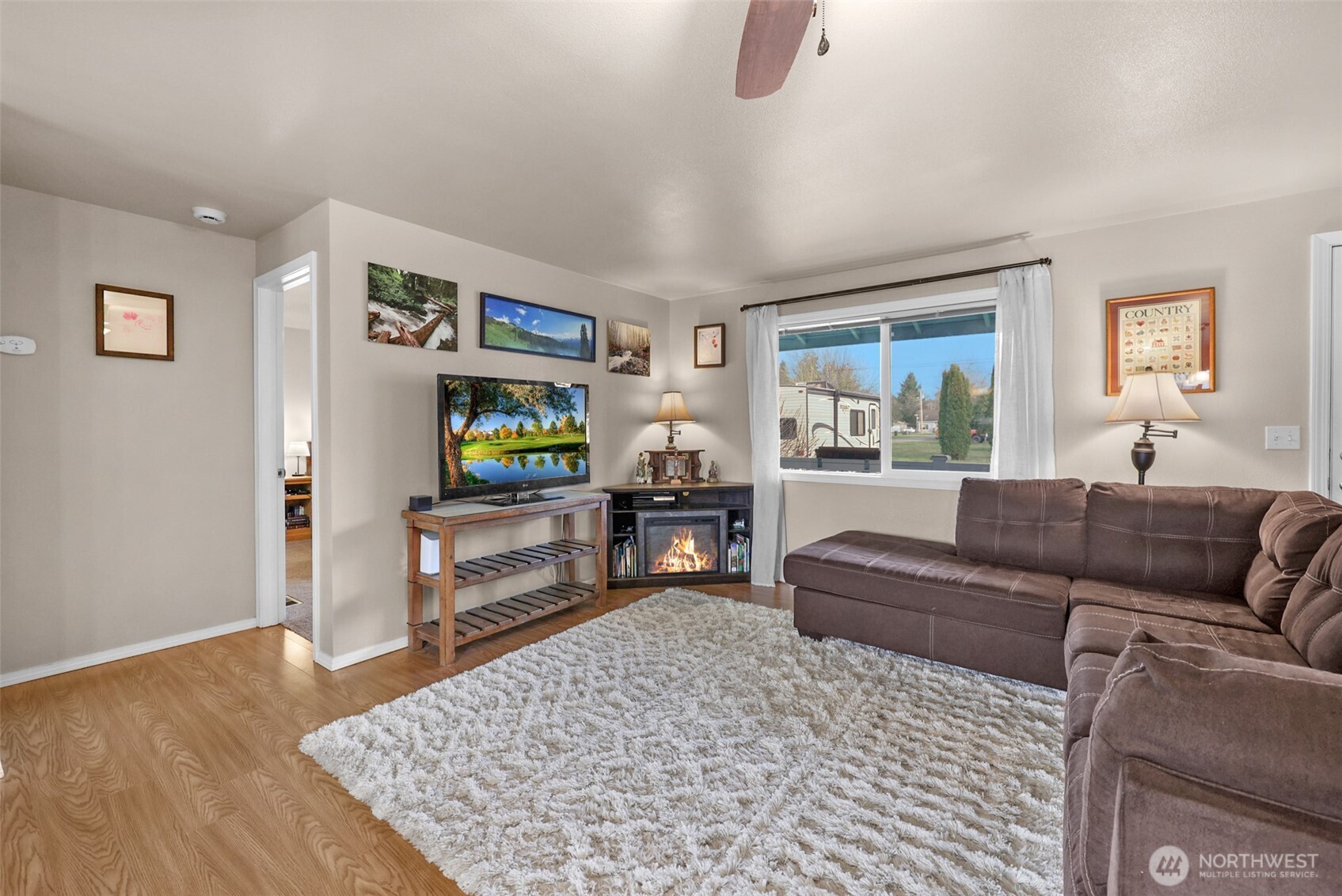 402 Haines Street Sedro-Woolley, WA 98284 - Photo 11 of 24 a living room with furniture and a flat screen tv