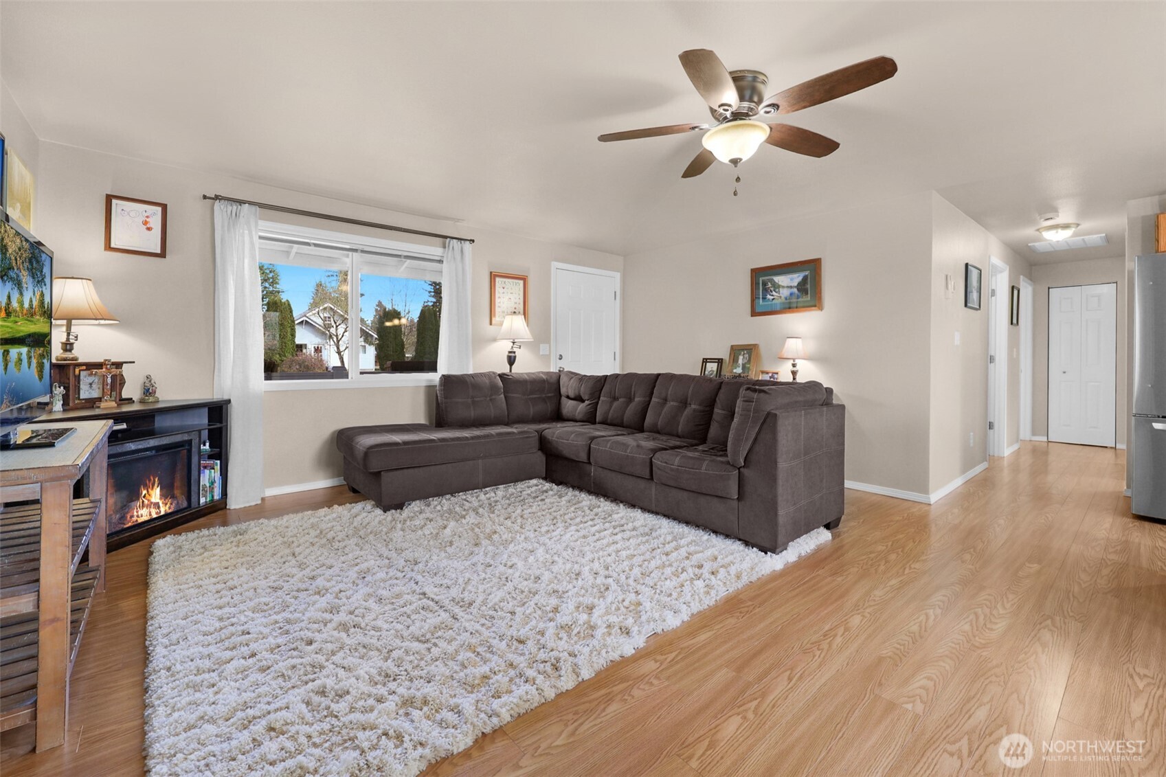 402 Haines Street Sedro-Woolley, WA 98284 - Photo 12 of 24 a living room with furniture and a wooden floor