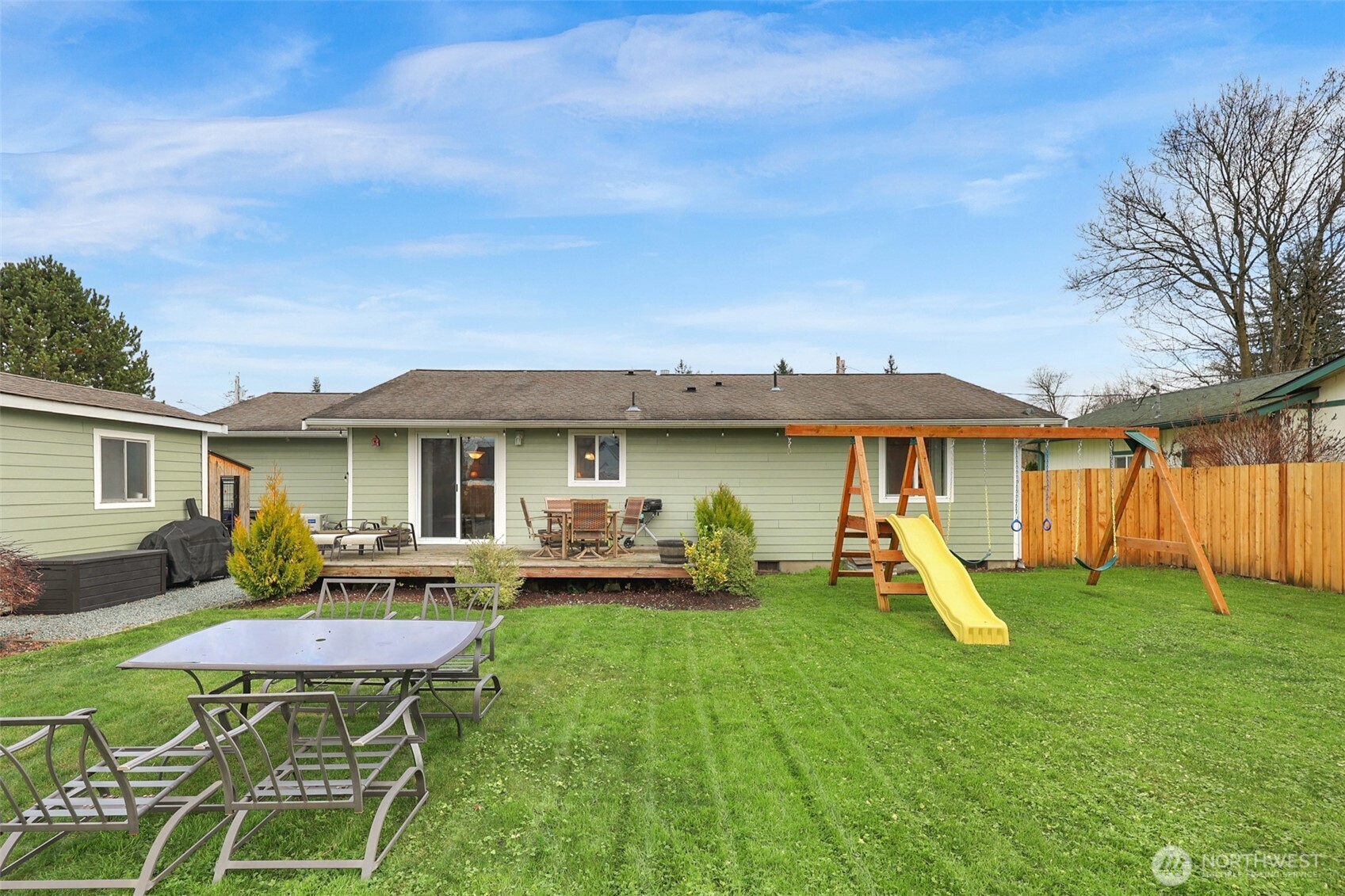 402 Haines Street Sedro-Woolley, WA 98284 - Photo 24 of 24 a view of a house with a yard patio and a slide