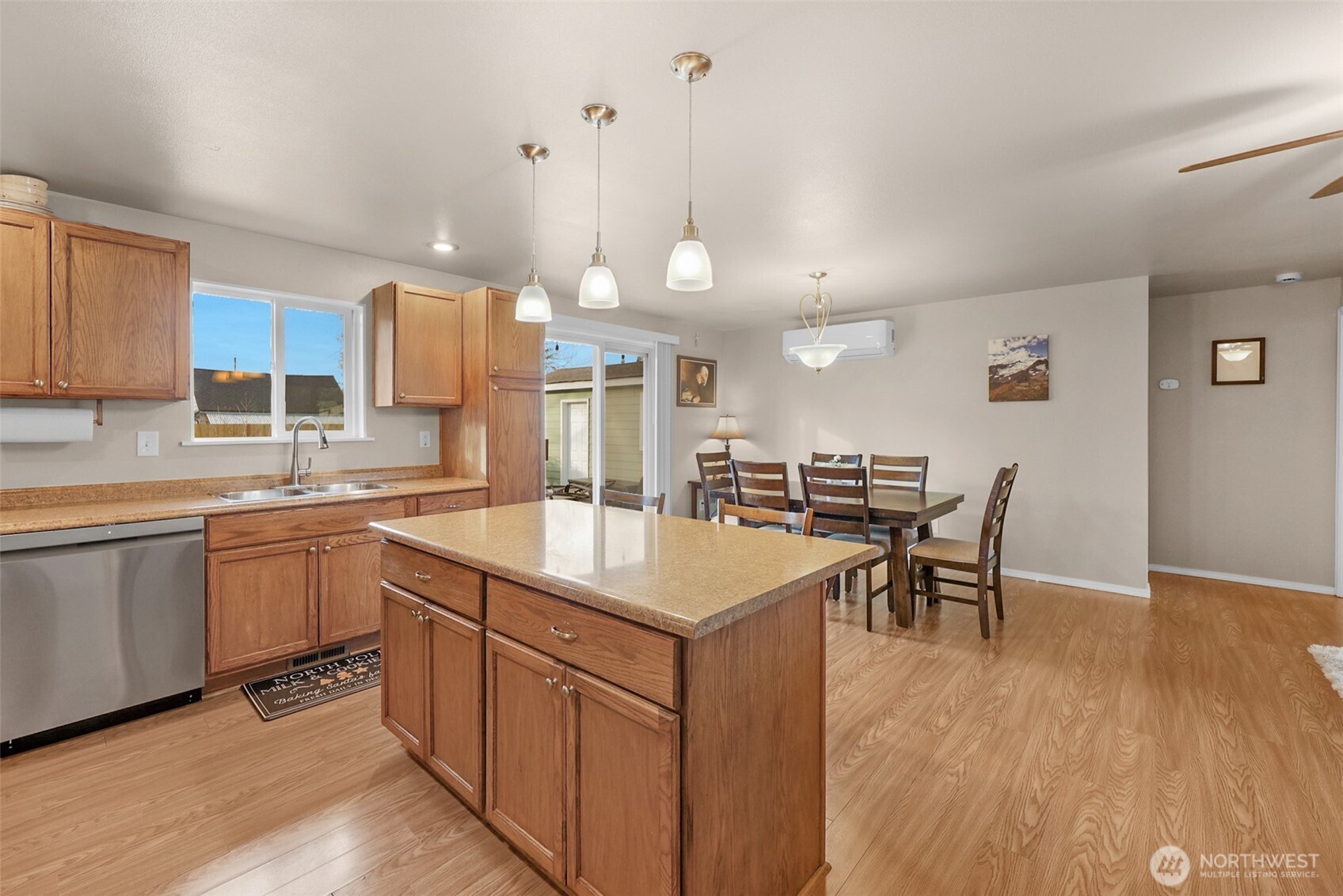 402 Haines Street Sedro-Woolley, WA 98284 - Photo 7 of 24 a kitchen with a table chairs sink and cabinets