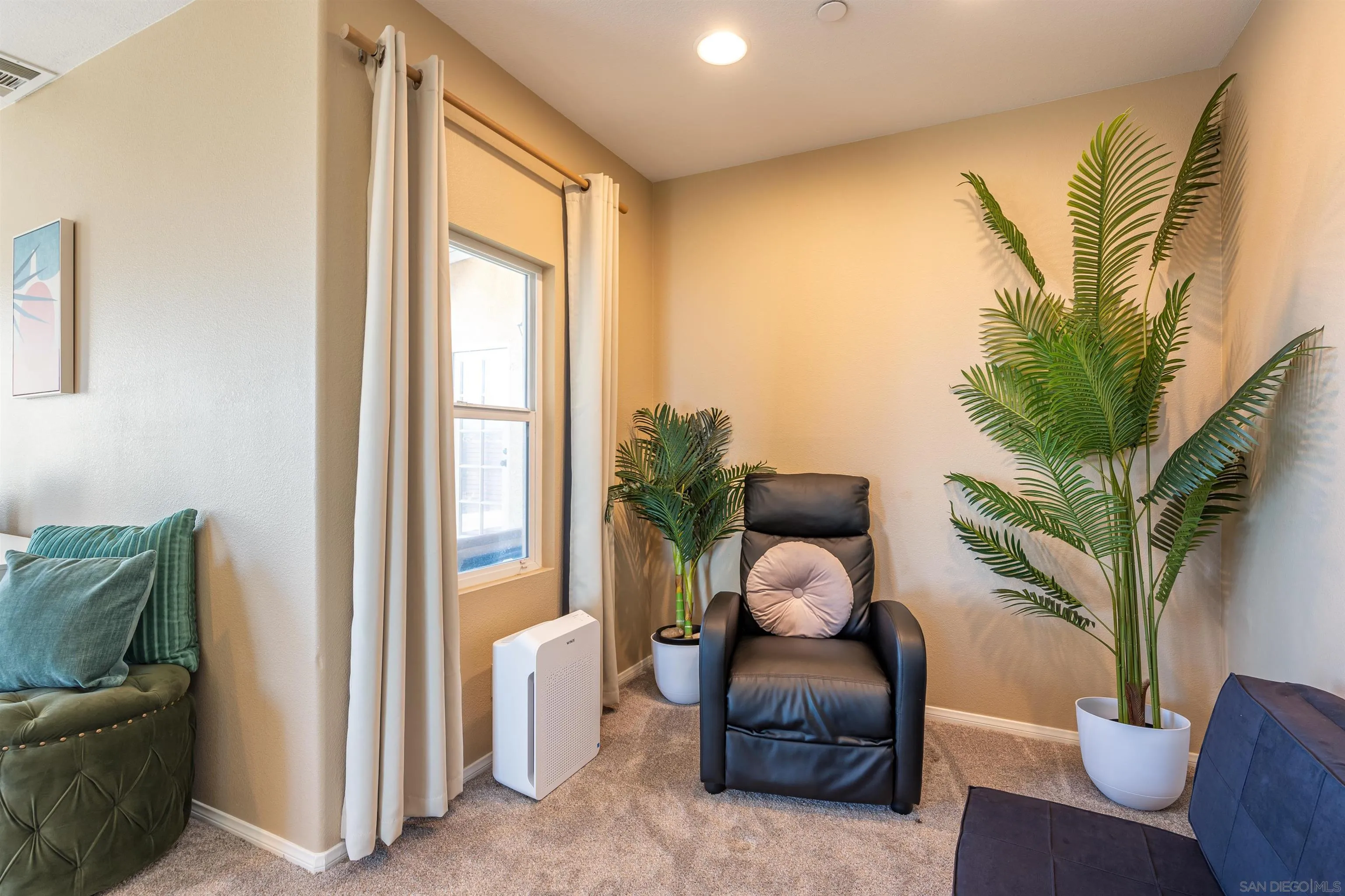 1152 Stoneridge Road El Cajon, CA 92021 - Photo 16 of 71 a living room with furniture and a large window