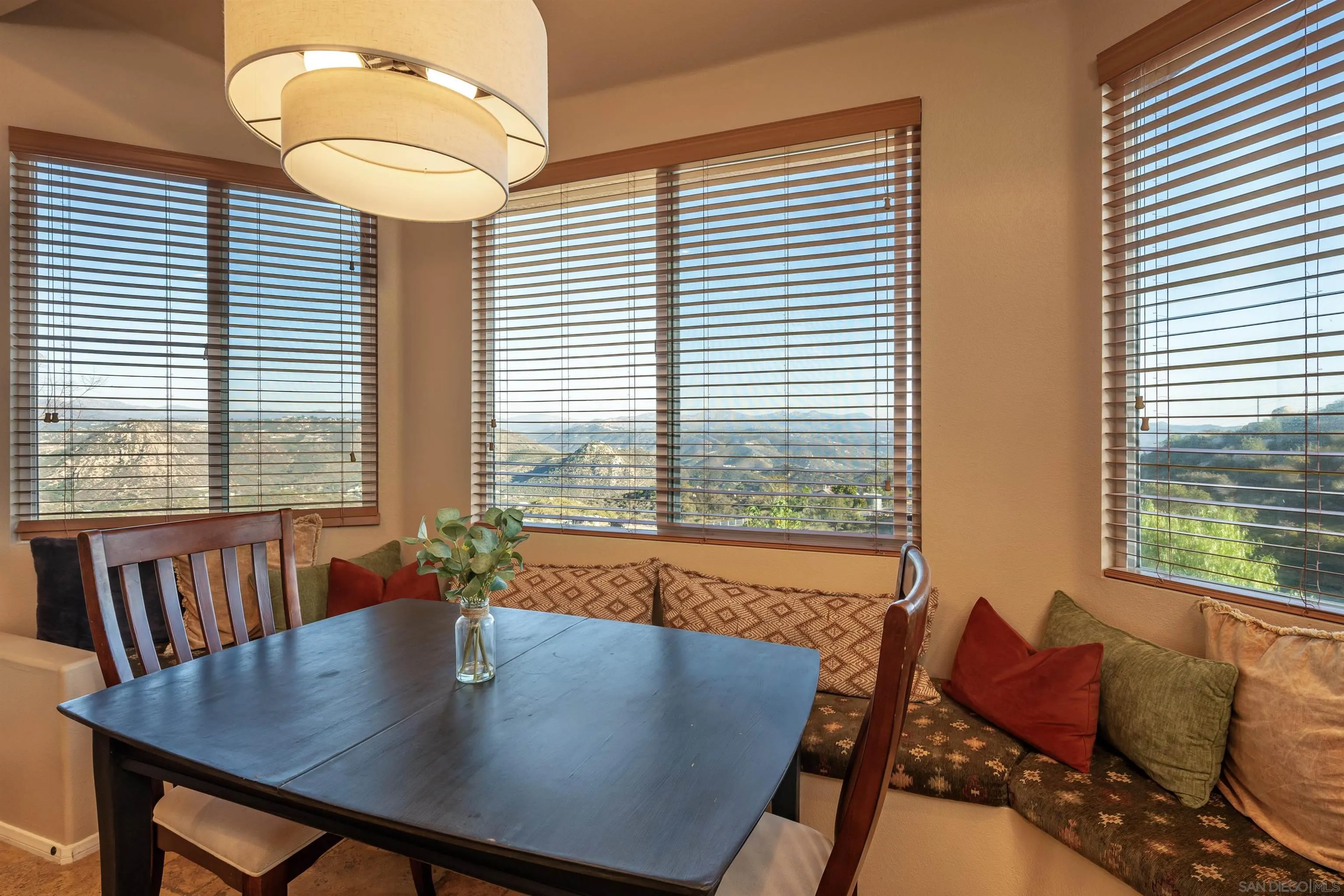 1152 Stoneridge Road El Cajon, CA 92021 - Photo 33 of 71 a view of a dining room with furniture and window