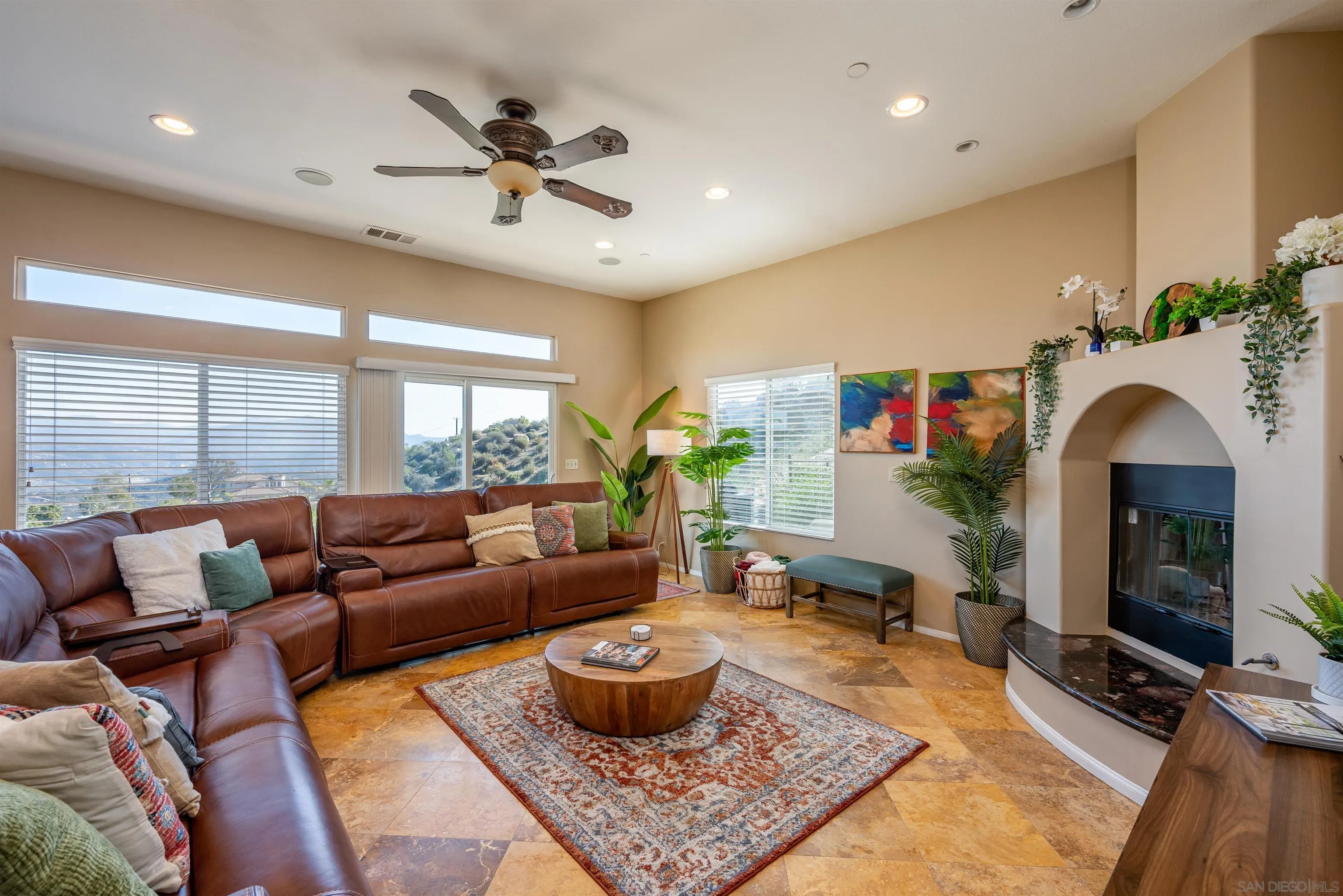 1152 Stoneridge Road El Cajon, CA 92021 - Photo 4 of 71 a living room with furniture and a fireplace