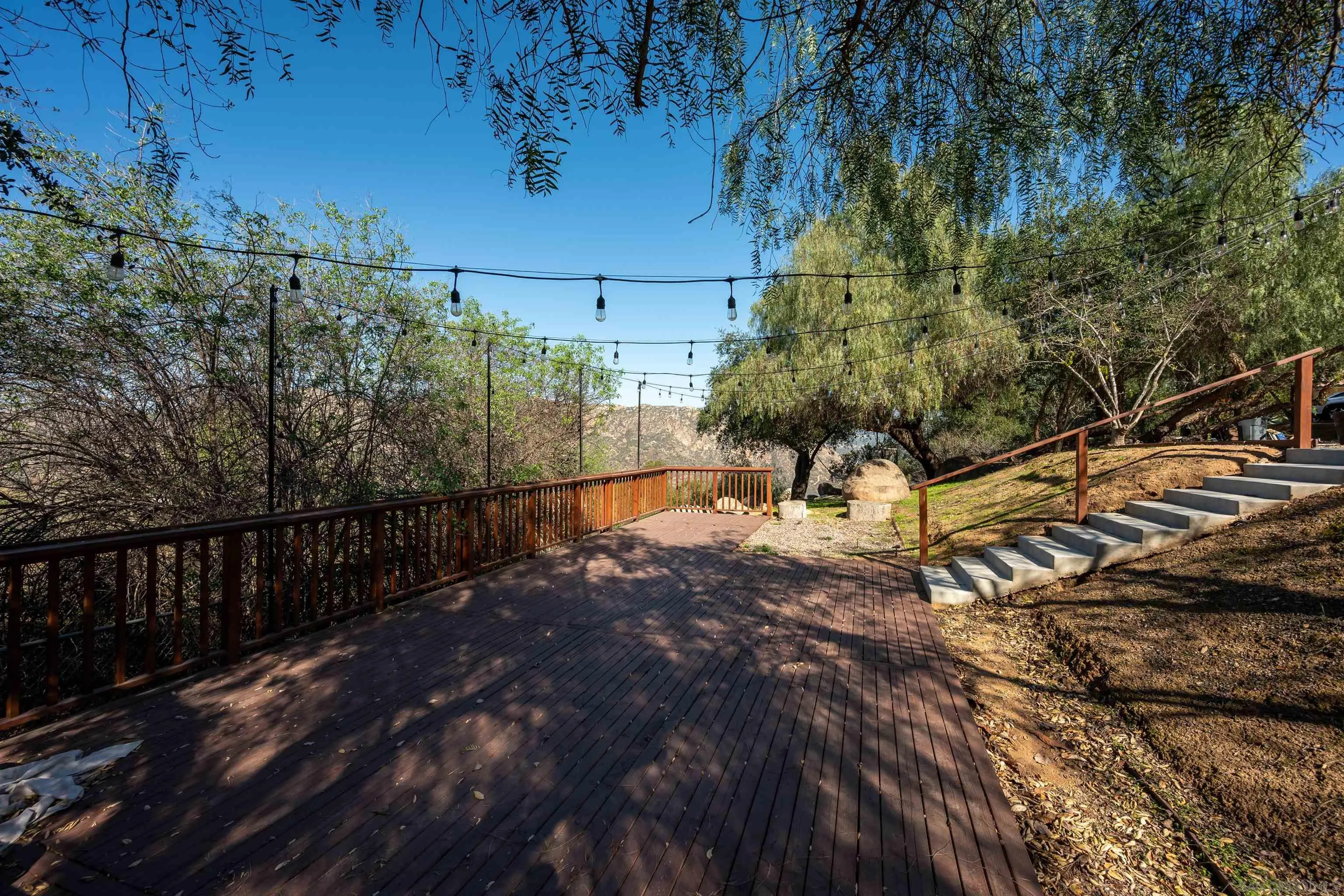 1152 Stoneridge Road El Cajon, CA 92021 - Photo 48 of 71 a view of a yard with wooden fence