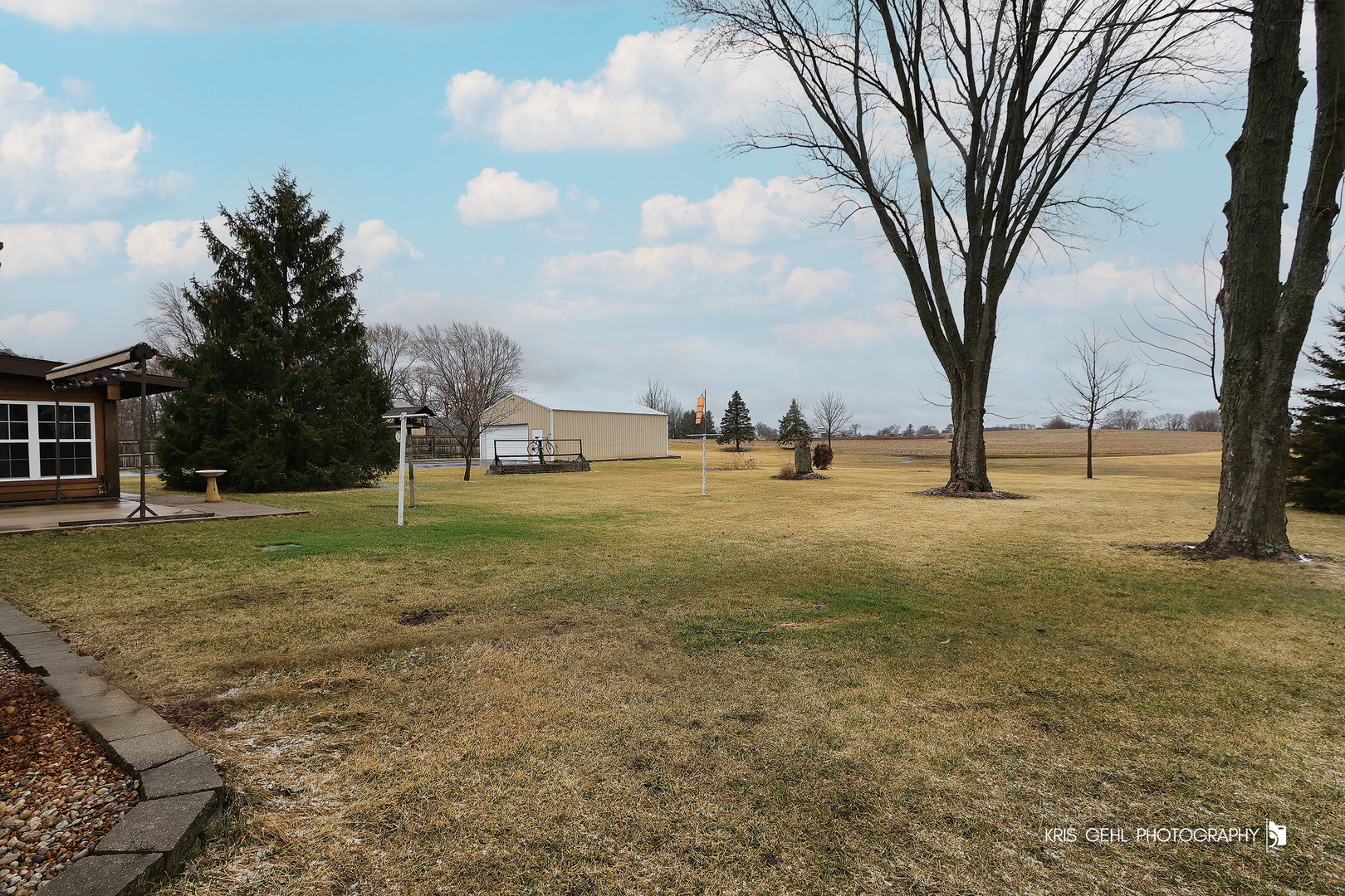3409 Chukar Road Woodstock, IL 60098 - Photo 13 of 15 a view of yard with tree s
