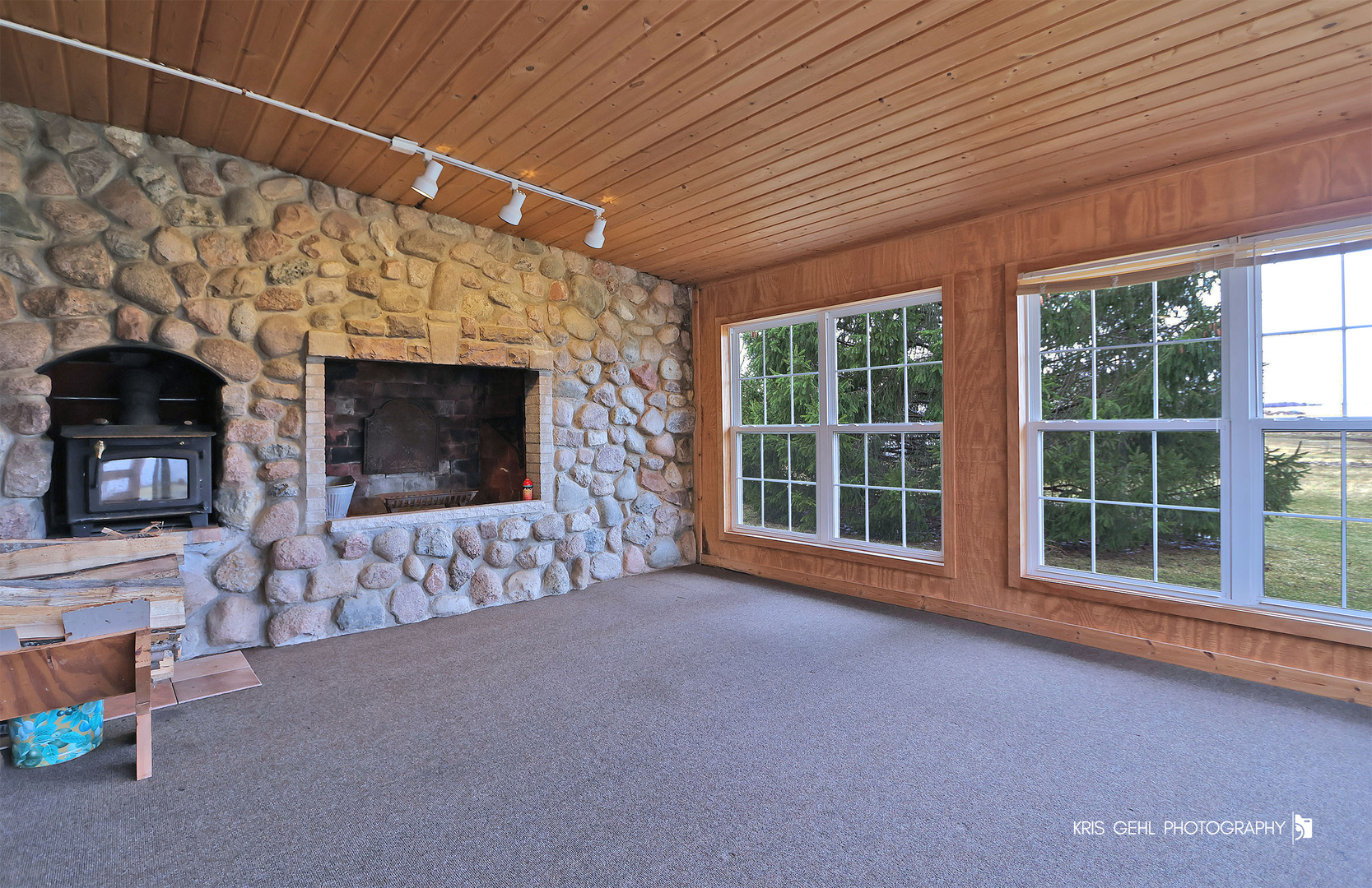 3409 Chukar Road Woodstock, IL 60098 - Photo 4 of 15 a view of empty room with a fireplace