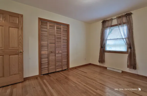 a view of a room with table and a stove