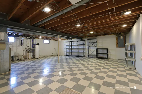 an empty room with a empty space and windows