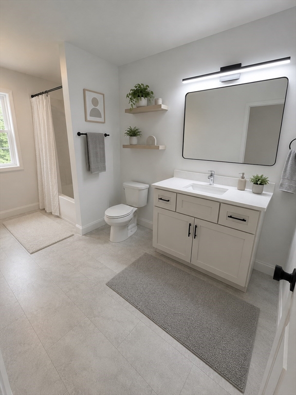 39 Lincoln Street, Unit A / B Webster, MA 01570 - Photo 31 of 33 a bathroom with a toilet sink and mirror