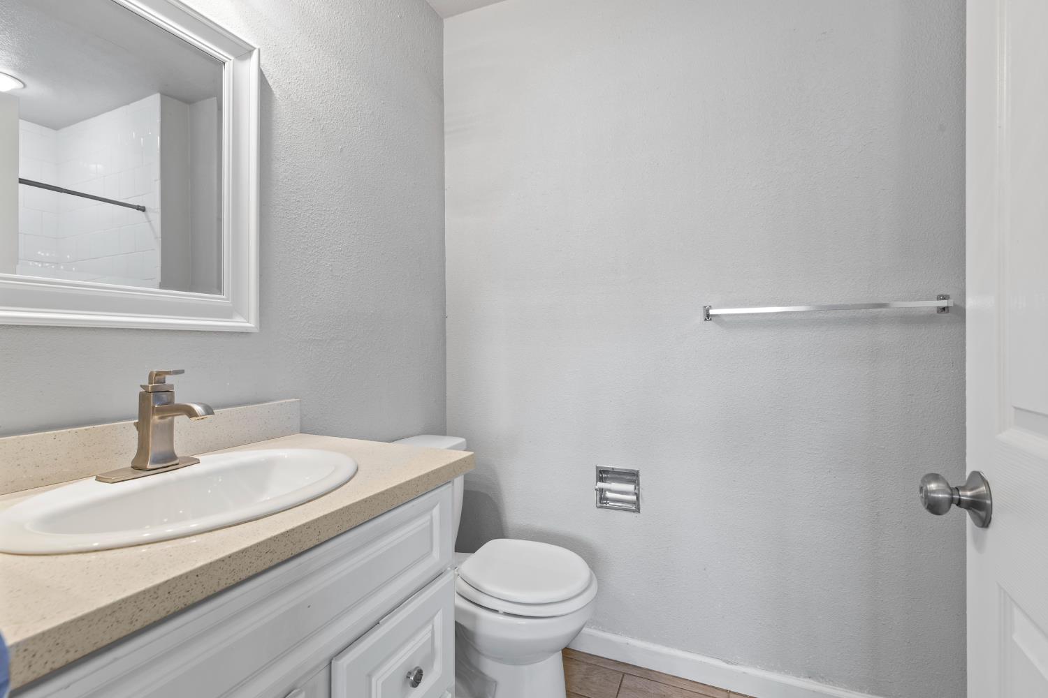 2525 Orwell Court Modesto, CA 95354 - Photo 22 of 33 a bathroom with a sink toilet and a mirror