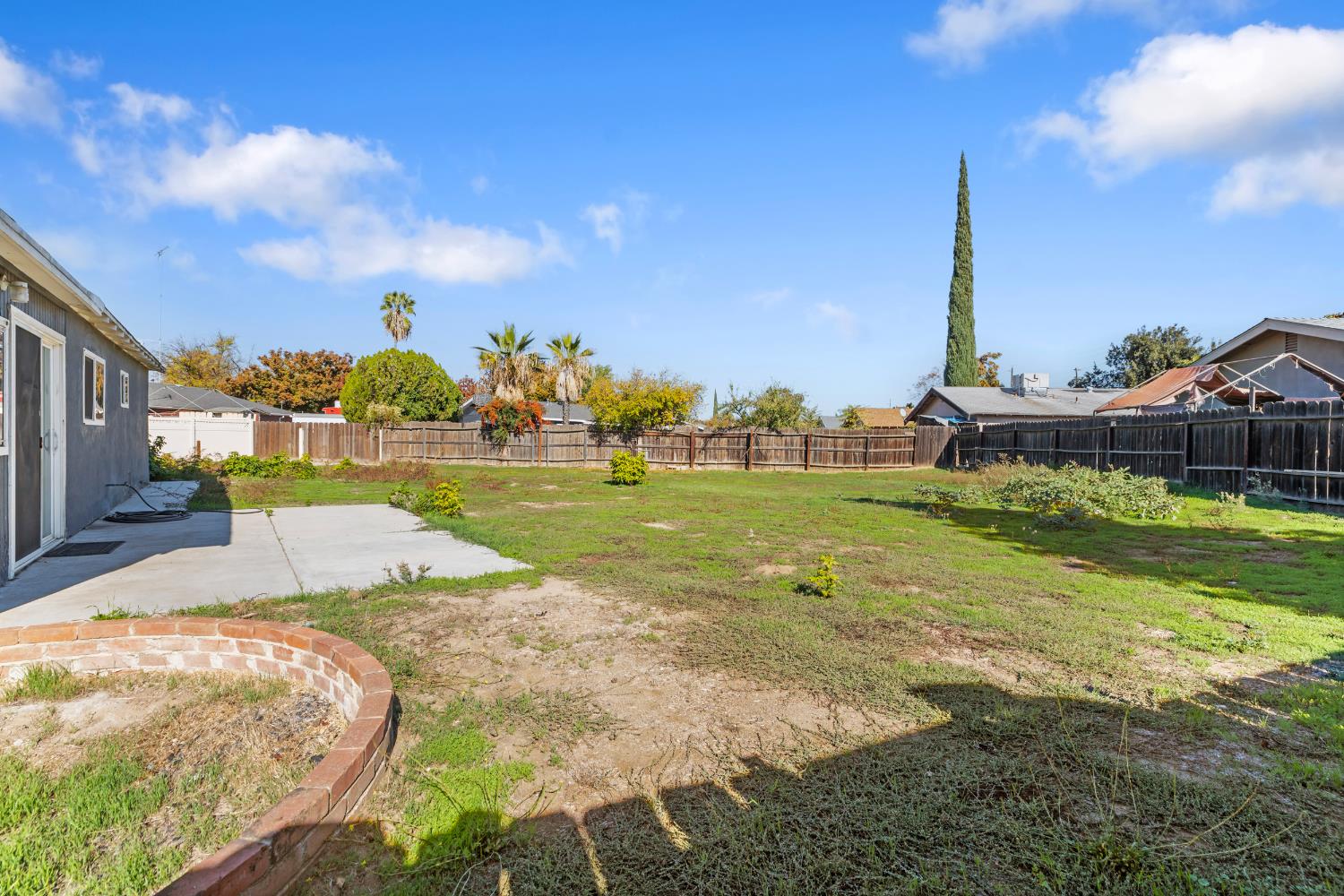 2525 Orwell Court Modesto, CA 95354 - Photo 24 of 33 a view of a swimming pool with a yard