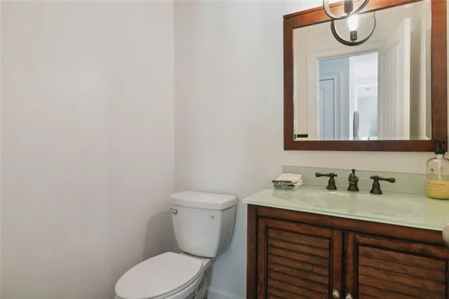 a bedroom with a large bed and a large window