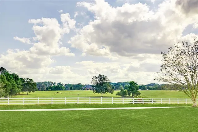 a sunset view with a lake