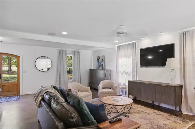 a bedroom with a bed and a couch