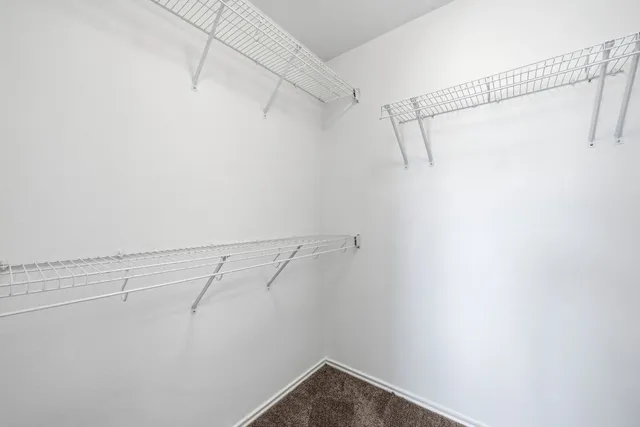 a view of a room with racks on the wall