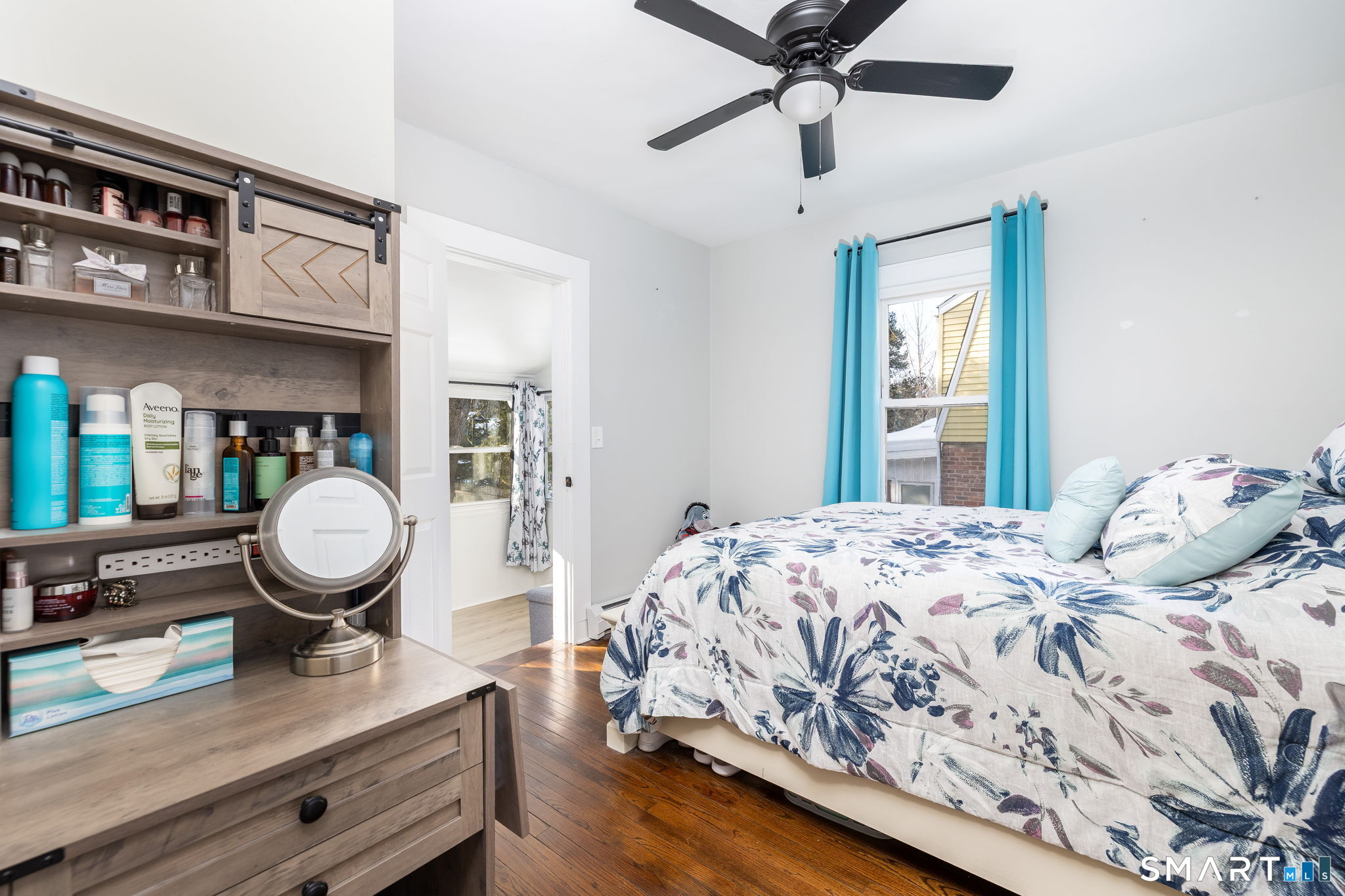 681 Main Street Cromwell, CT 06416 - Photo 16 of 39 a bedroom with a bed and window