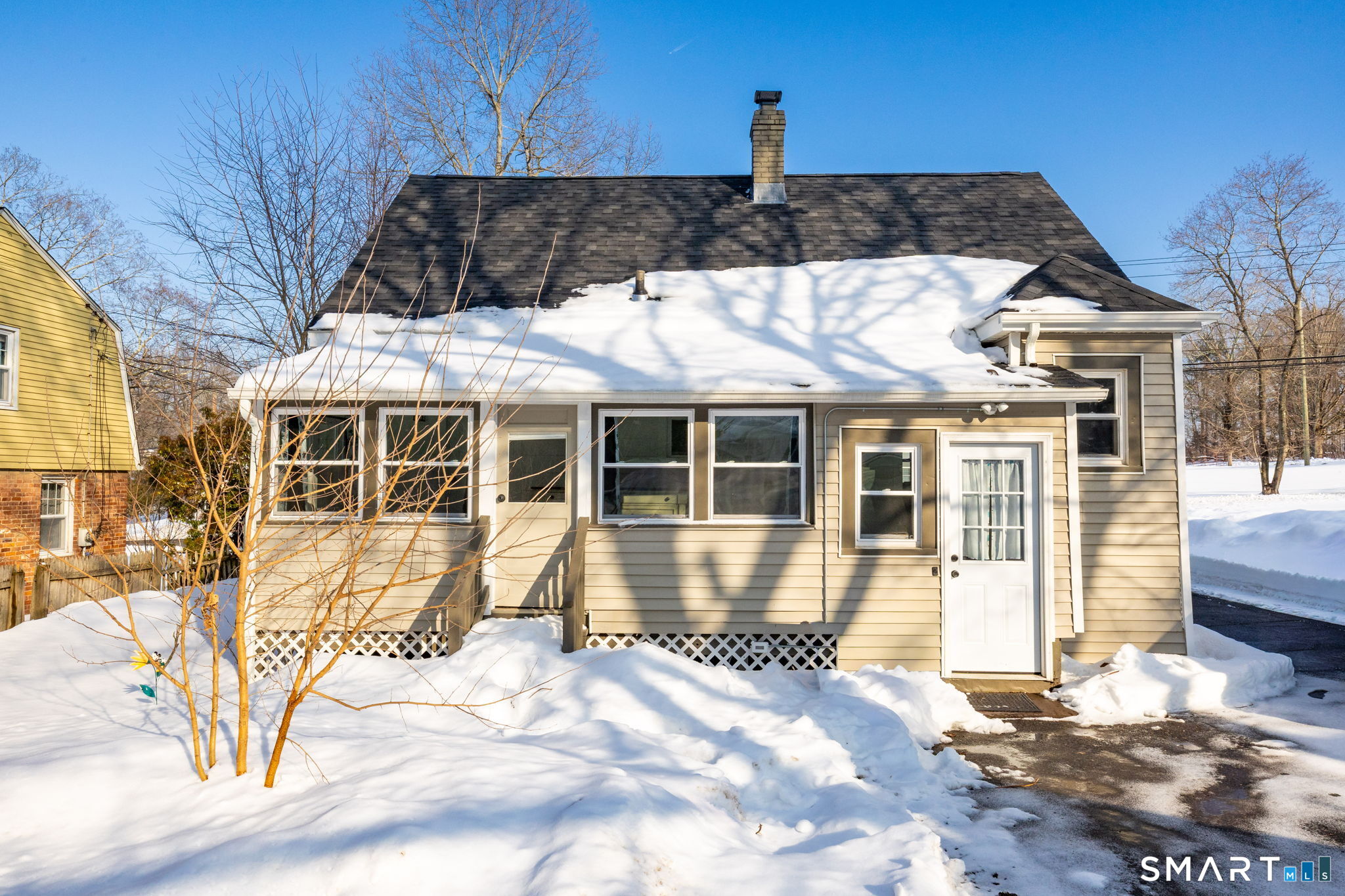 681 Main Street Cromwell, CT 06416 - Photo 6 of 39 a front view of a house with a yard
