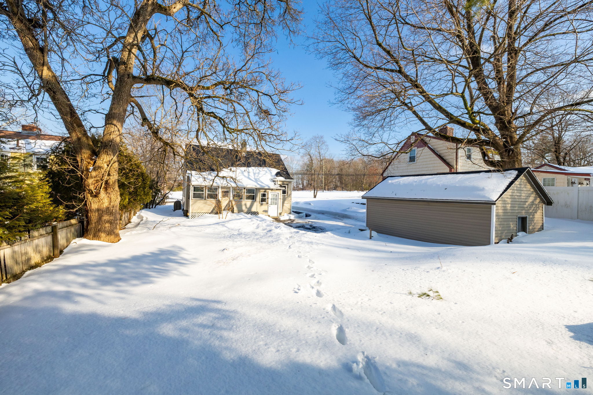 681 Main Street Cromwell, CT 06416 - Photo 7 of 39 a view of road and with trees