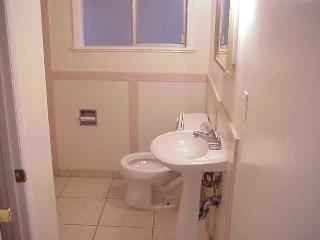 1039 South Wright Road Santa Rosa, CA 95407 - Photo 8 of 10 a bathroom with a sink and a mirror