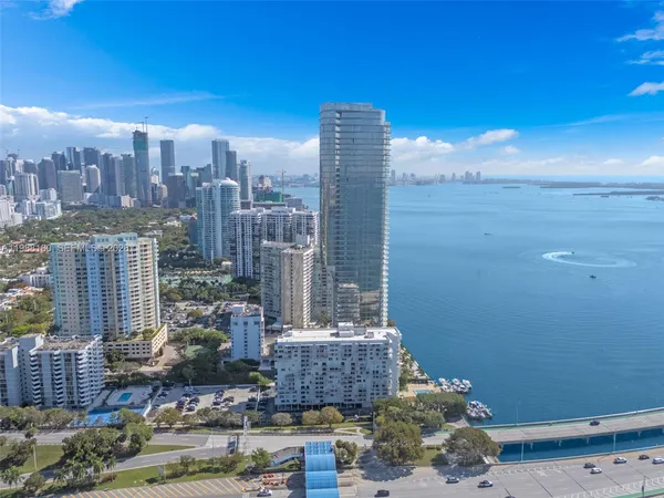 a view of a city with tall buildings