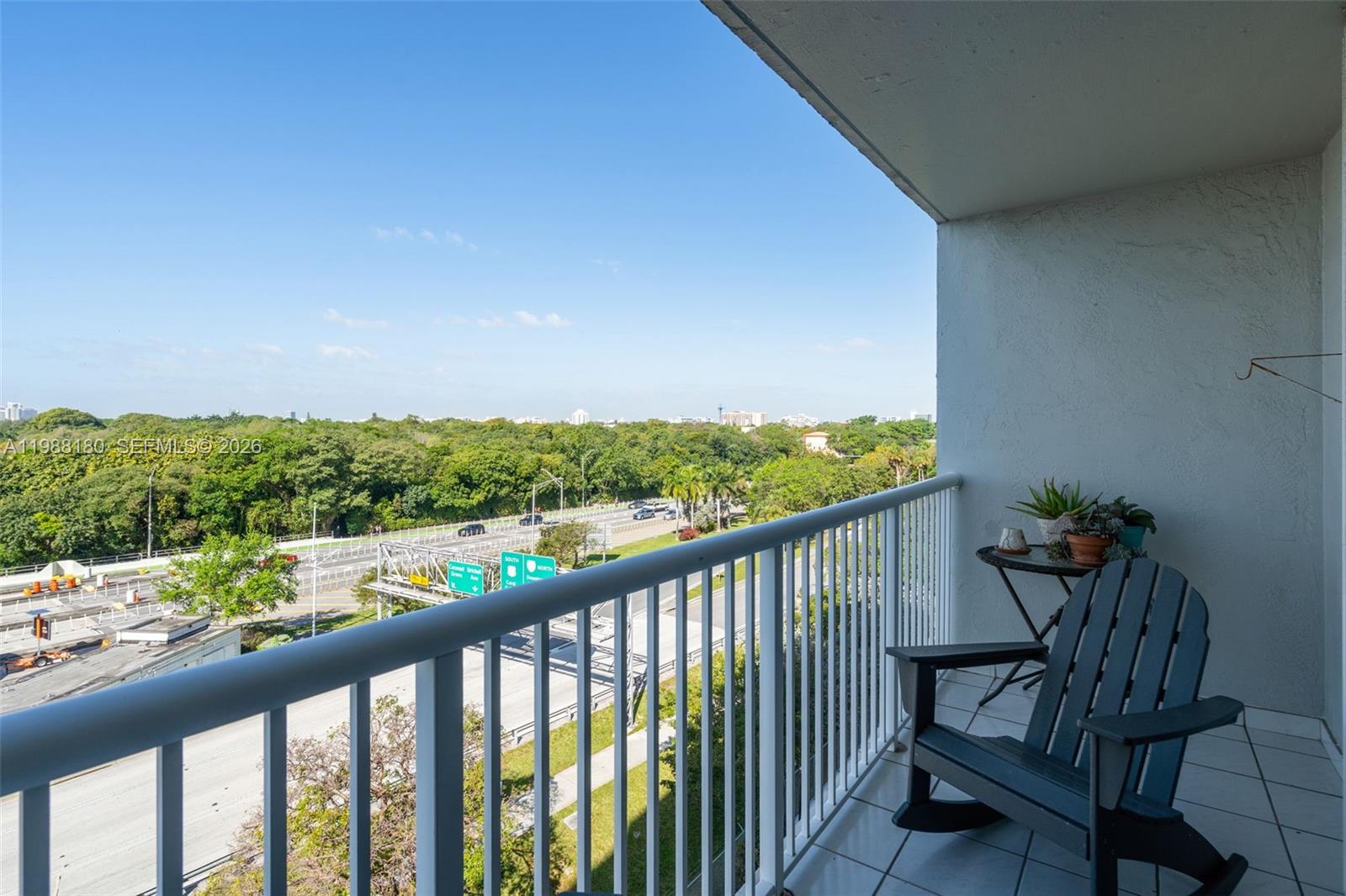 150 Southeast 25th Road, Unit 8H Miami, FL 33129 - Photo 20 of 41 a view of a porch with furniture