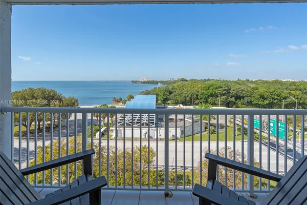 a view of a balcony with an outdoor space