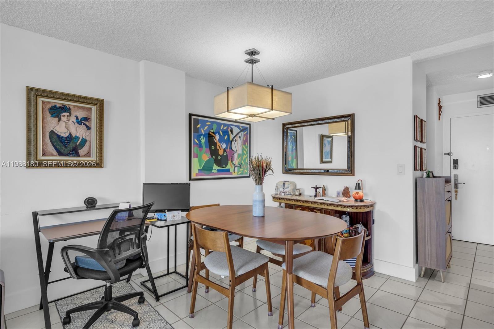 150 Southeast 25th Road, Unit 8H Miami, FL 33129 - Photo 33 of 41 a dining room with furniture and window