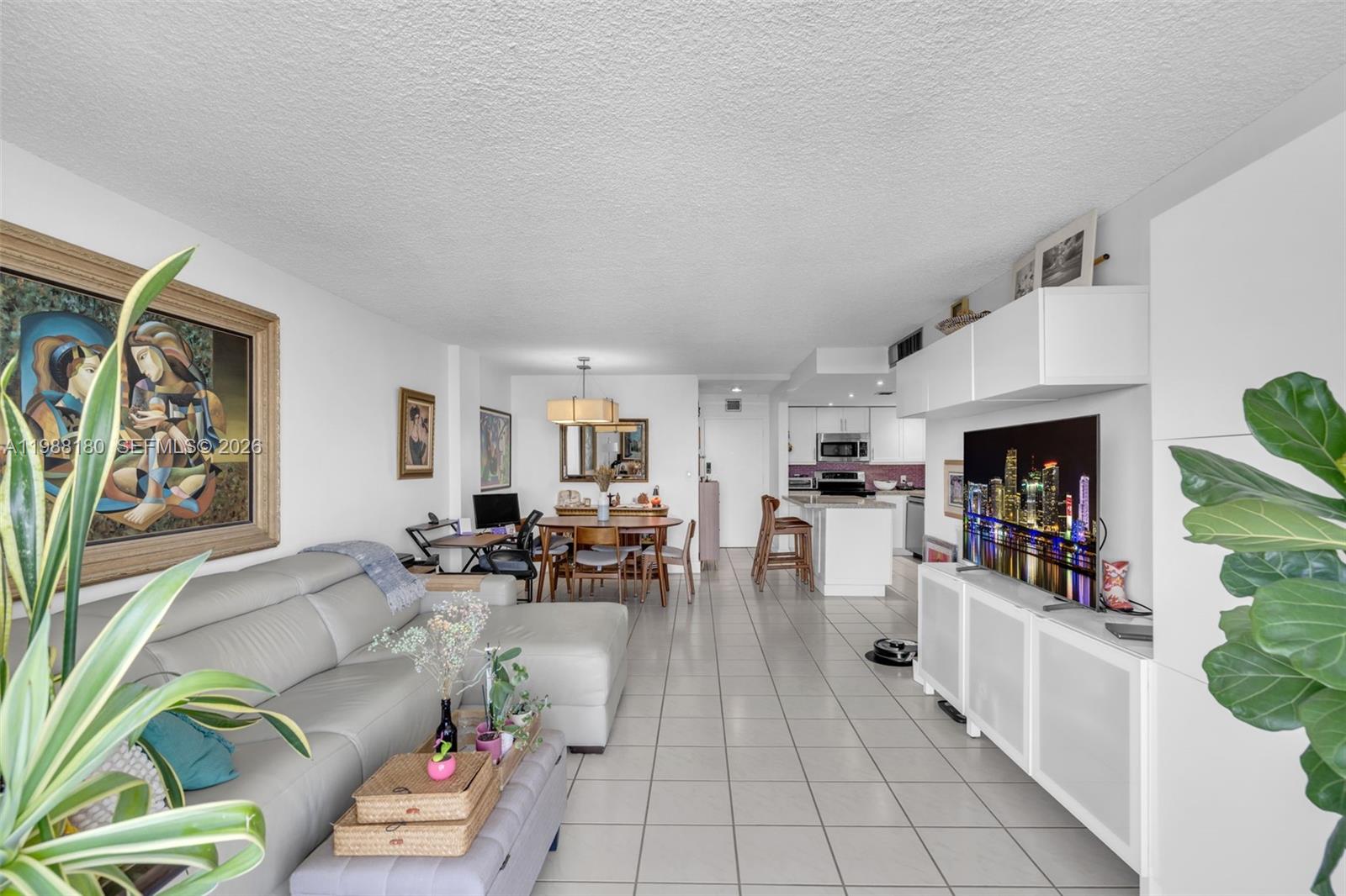 150 Southeast 25th Road, Unit 8H Miami, FL 33129 - Photo 36 of 41 a living room with furniture and a fireplace