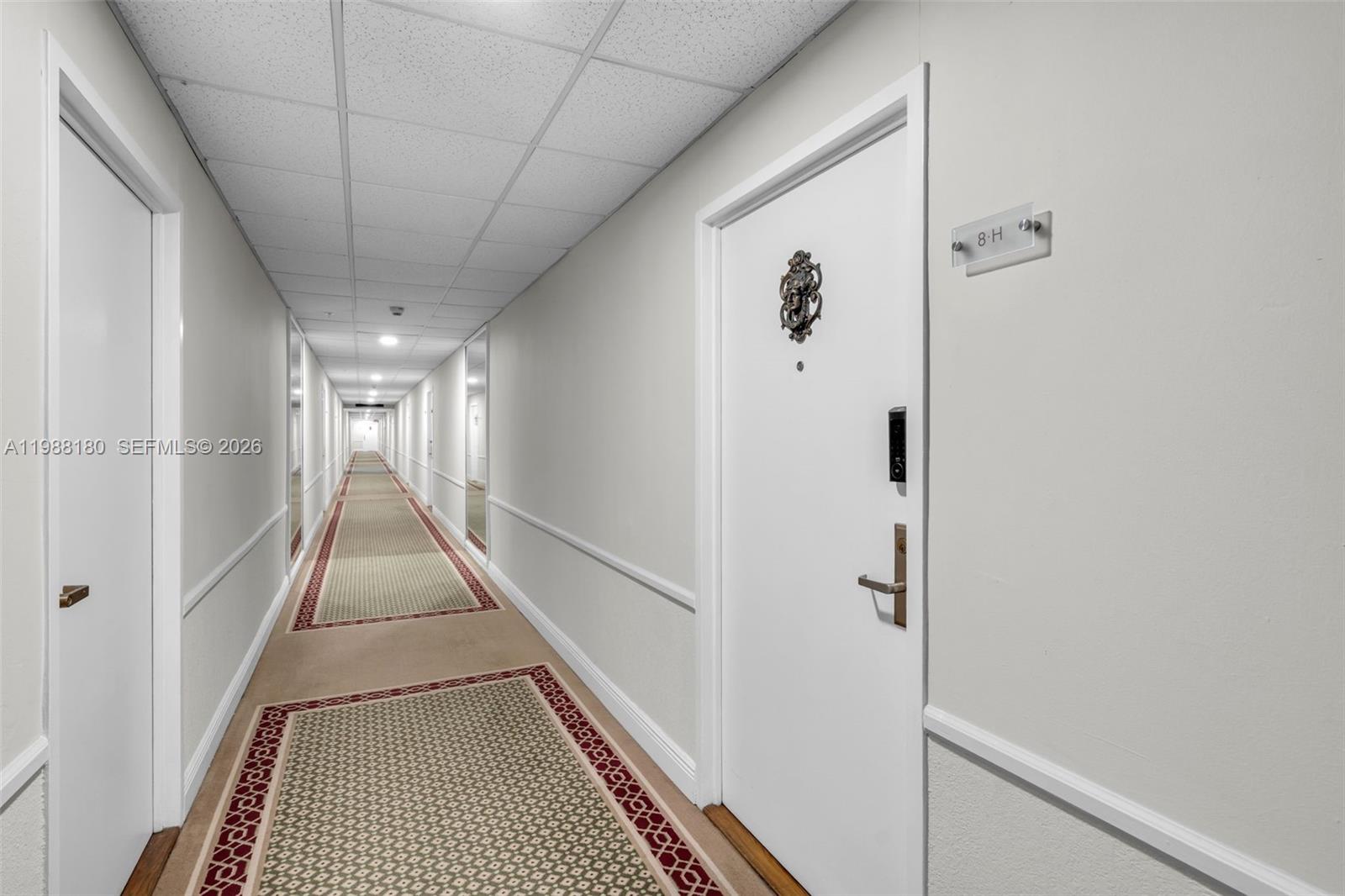 150 Southeast 25th Road, Unit 8H Miami, FL 33129 - Photo 40 of 41 a view of a hallway