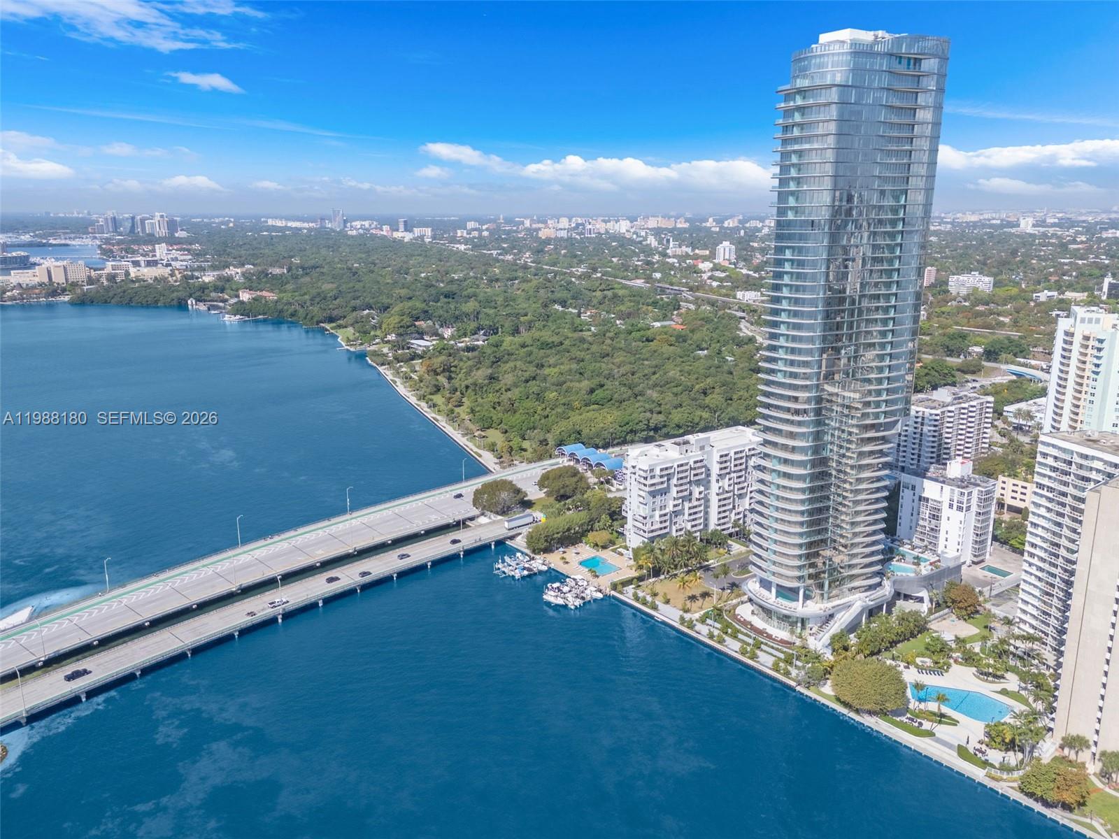 150 Southeast 25th Road, Unit 8H Miami, FL 33129 - Photo 5 of 41 a view of a lake with tall buildings