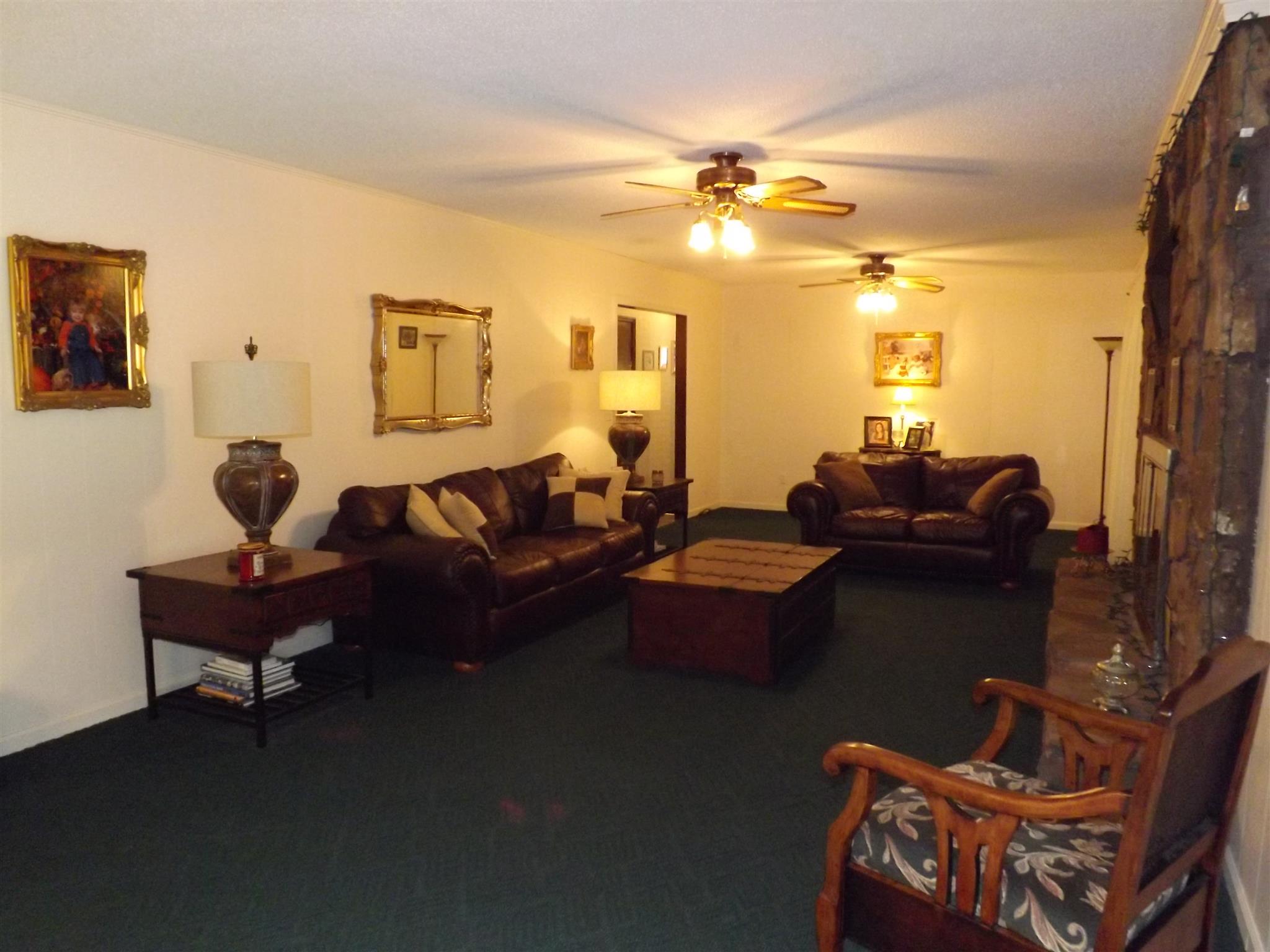 1600 Mud Creek Road Morrison, TN 37357 - Photo 11 of 28 a living room with furniture and a chandelier