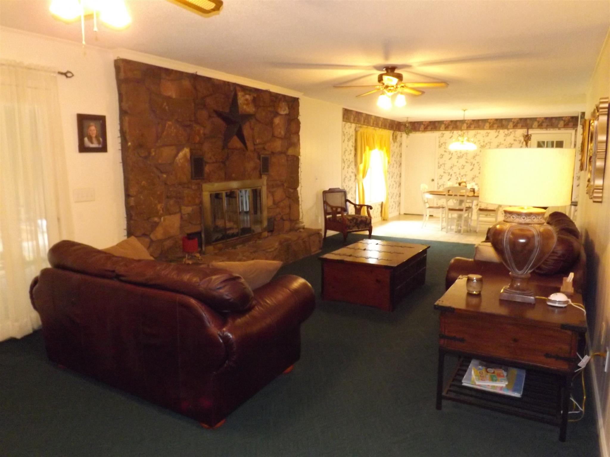 1600 Mud Creek Road Morrison, TN 37357 - Photo 12 of 28 a living room with furniture and a large window