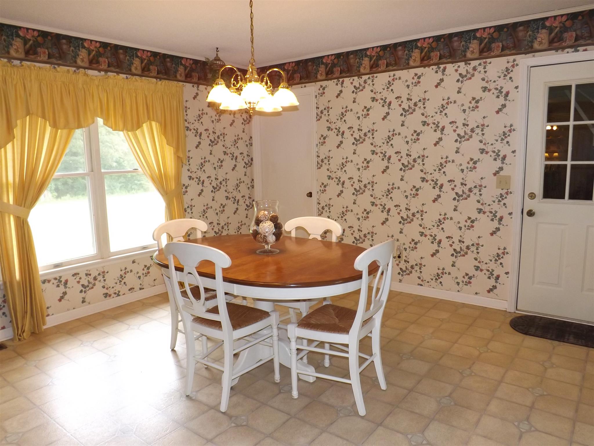 1600 Mud Creek Road Morrison, TN 37357 - Photo 17 of 28 a dining room with furniture and window