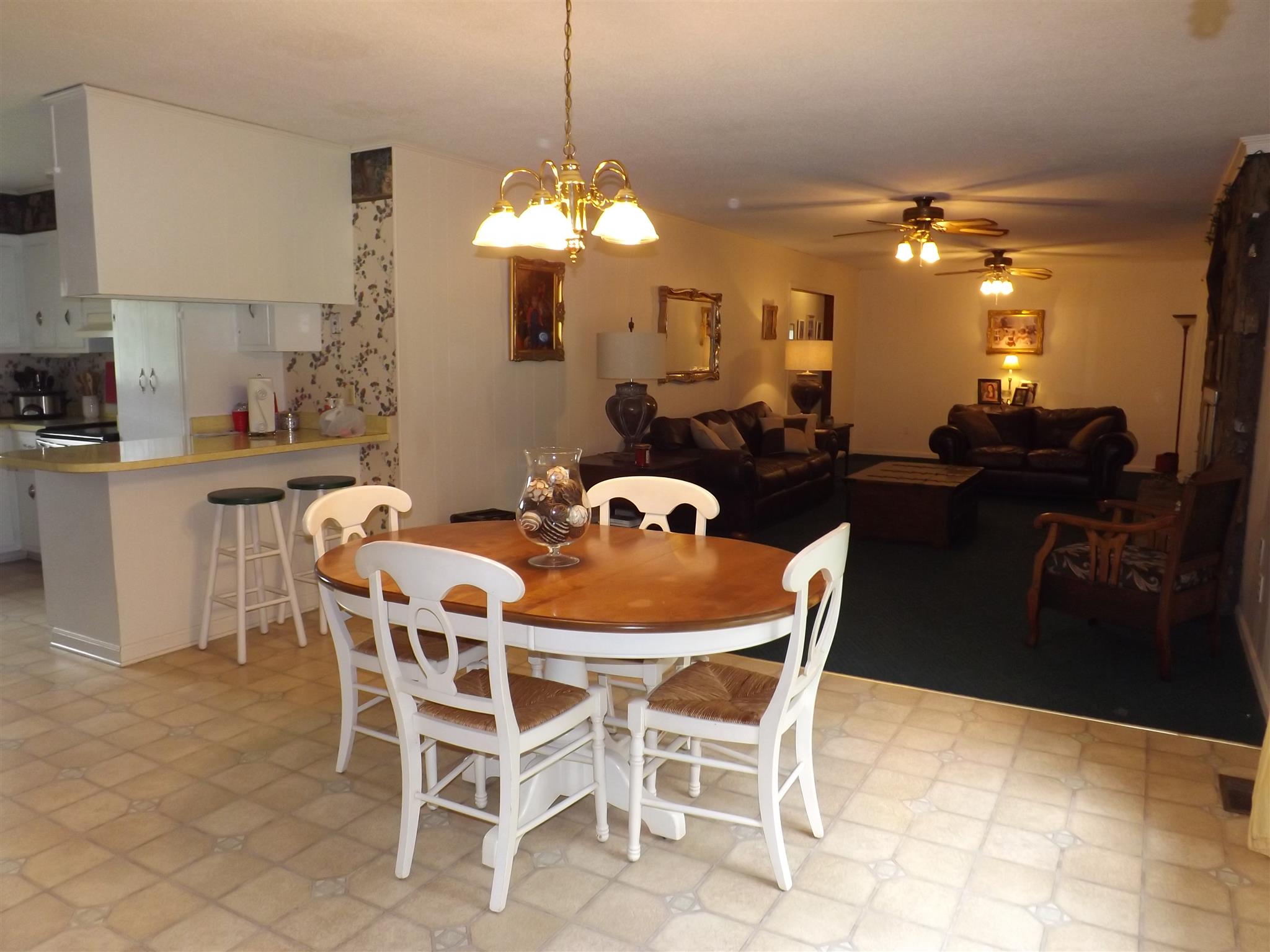 1600 Mud Creek Road Morrison, TN 37357 - Photo 18 of 28 a dining room with furniture and chandelier