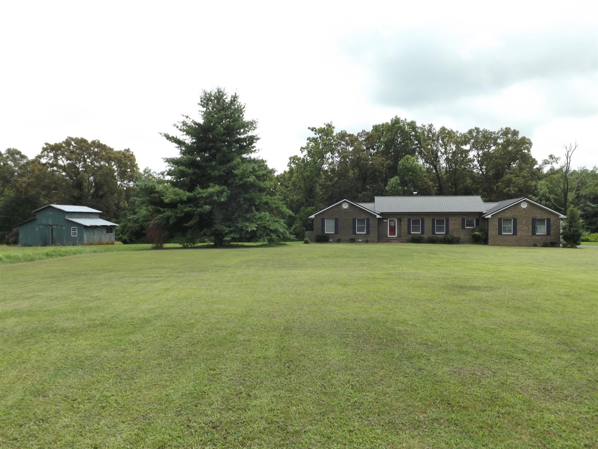 1600 Mud Creek Road Morrison, TN 37357 - Photo 2 of 28 a view of a house with a yard and sitting area