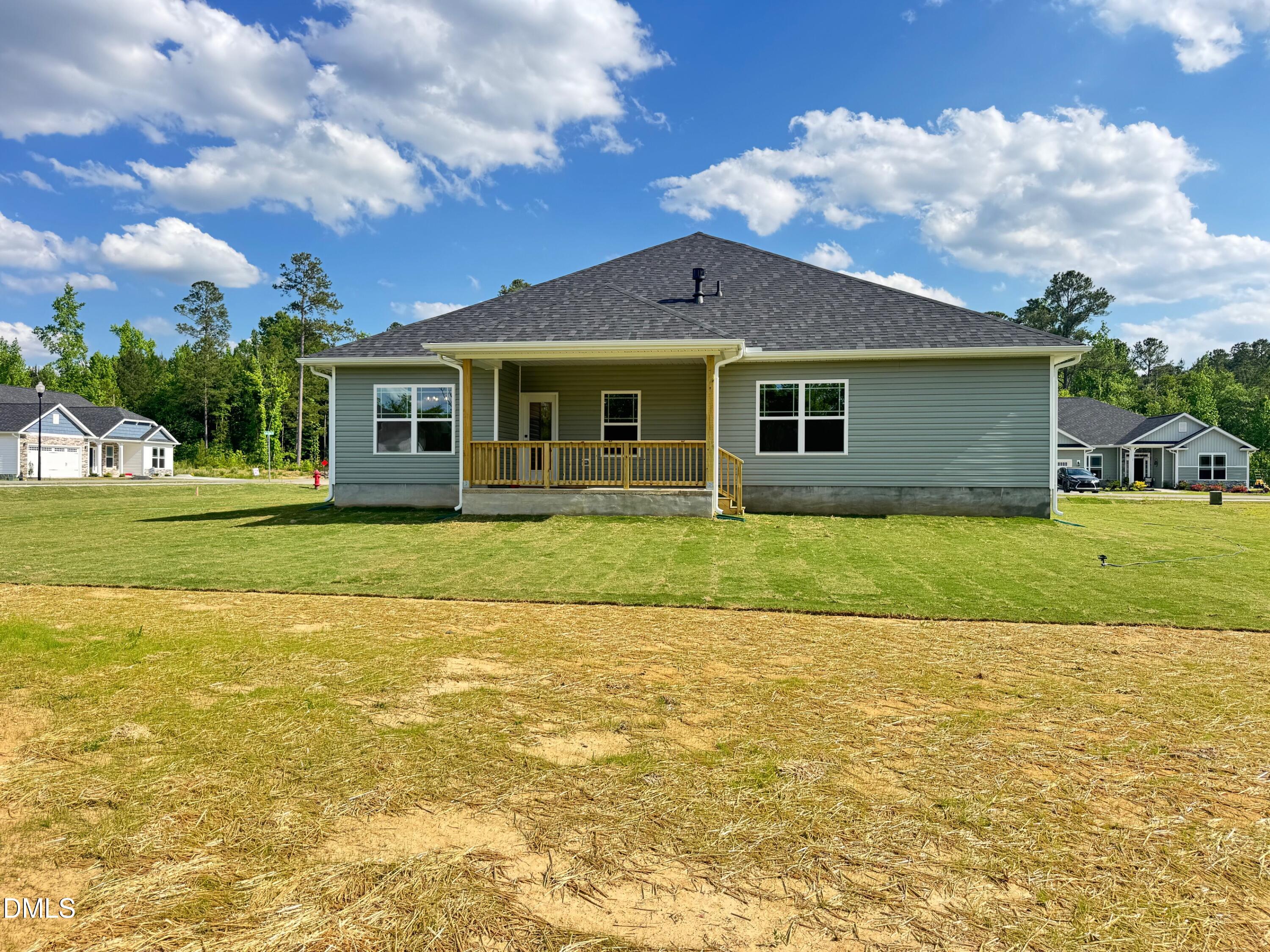 20 Streamline Court Lillington, NC 27546 - Photo 29 of 46 a front view of house with yard and green space