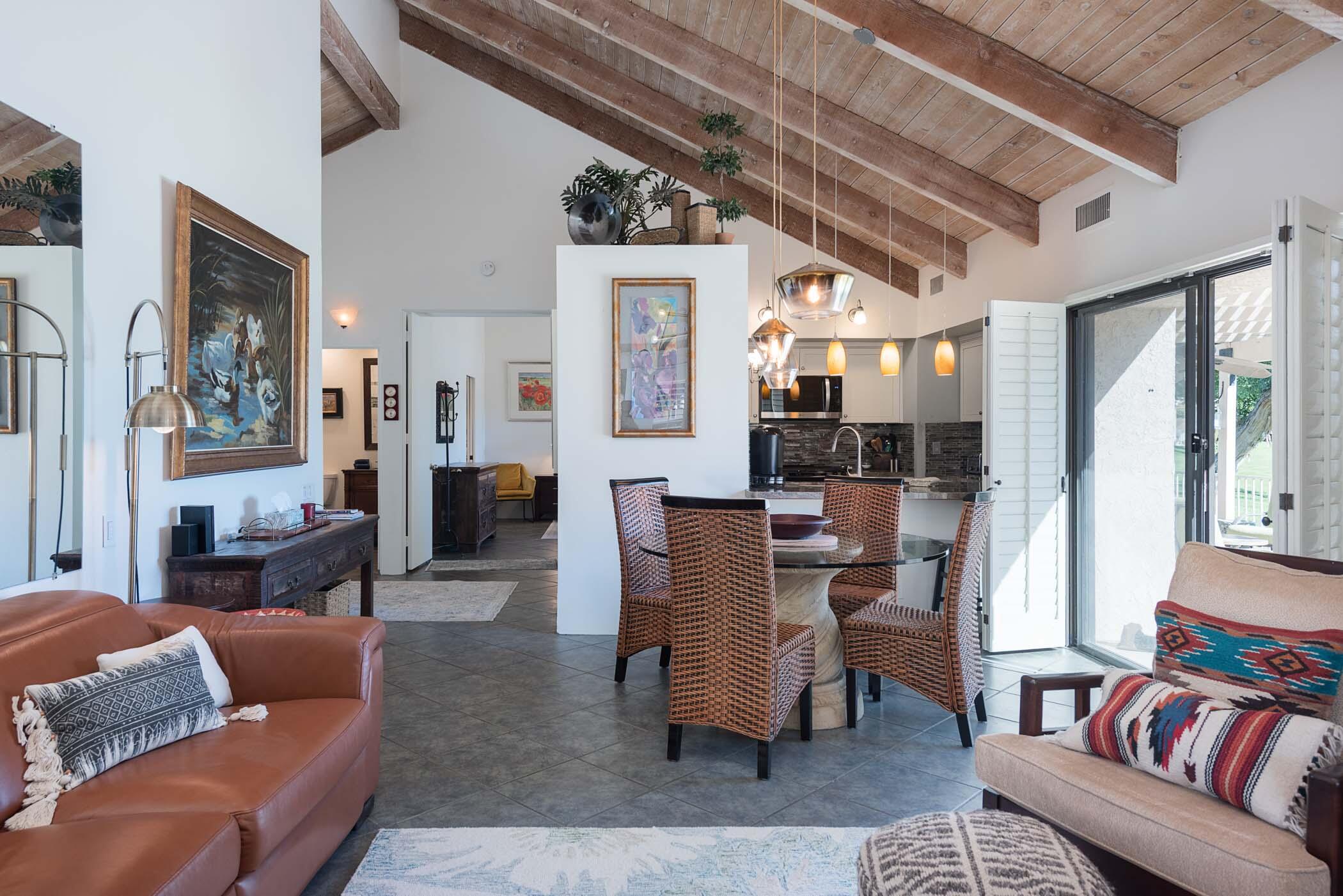 345 Forest Hills Drive Rancho Mirage, CA 92270 - Photo 2 of 37 a living room with furniture and a large window