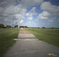 a view of a lake with a big yard