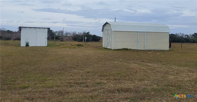 a view of outdoor space and yard