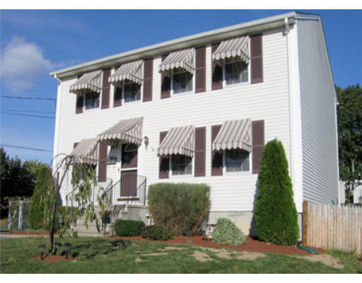 140 Cleveland Street Woonsocket, RI 02895 - Photo 1 of 26 a view of front of house with a yard